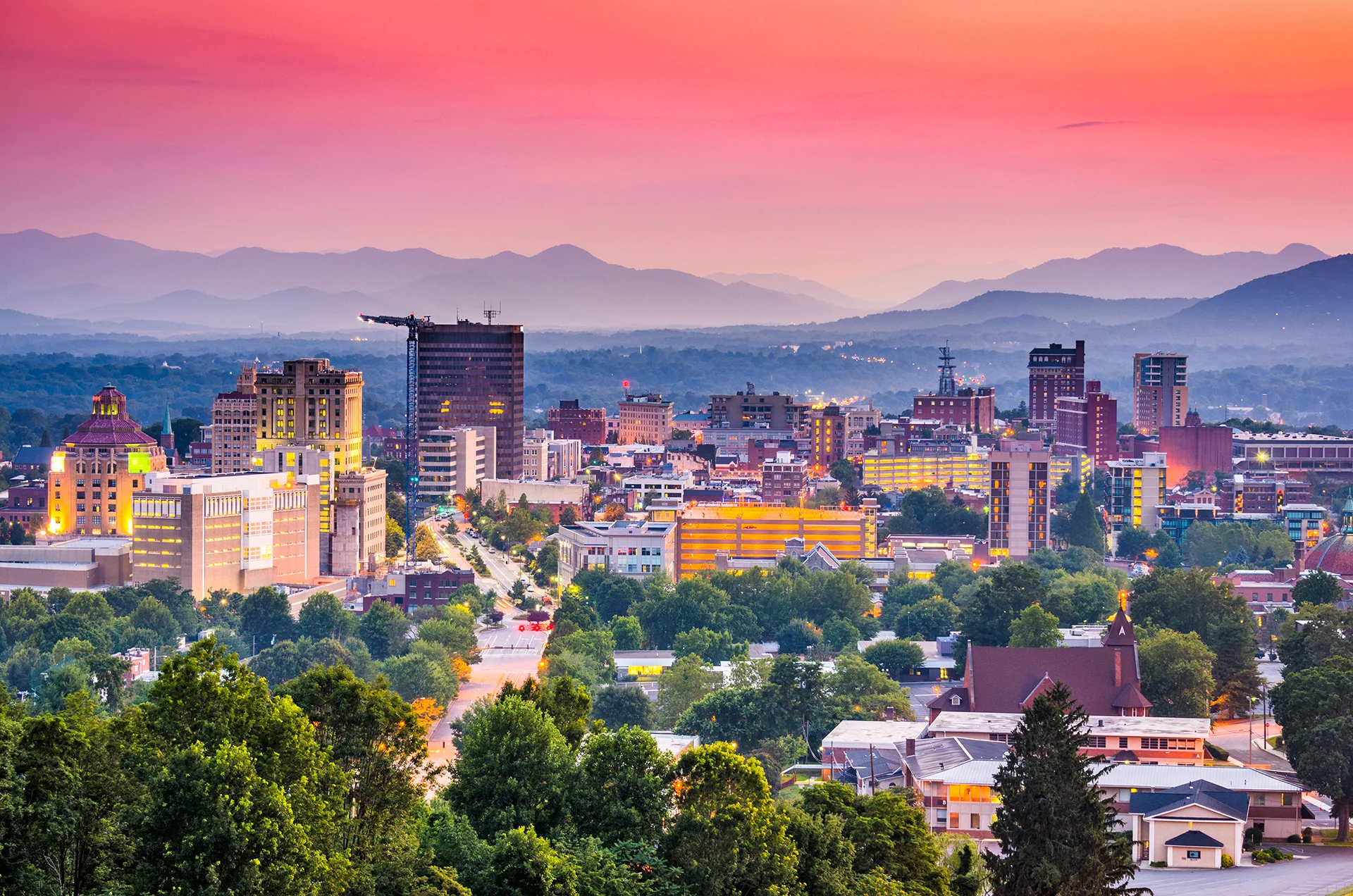neighboring web design agency dispalying stunning image of asheville skyline at dusk